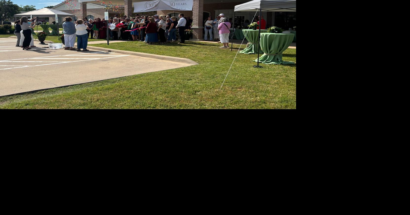 Holland Lake Rehabilitation & Wellness Center cuts the ribbon commemorating 30 years of service