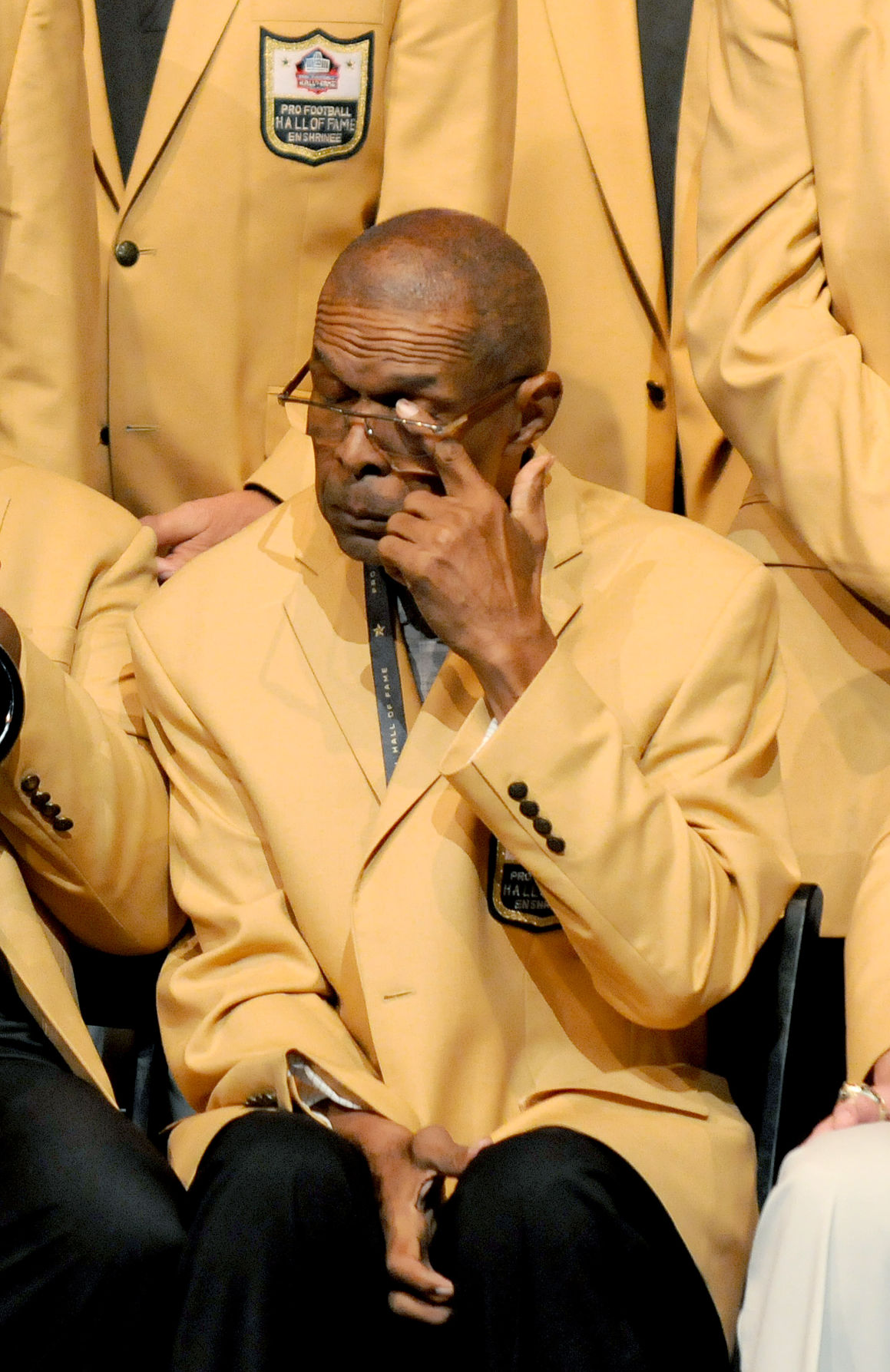 A teary-eyed Terrell Davis receives his gold jacket. “I'm a Hall of Famer  now.” – The Denver Post