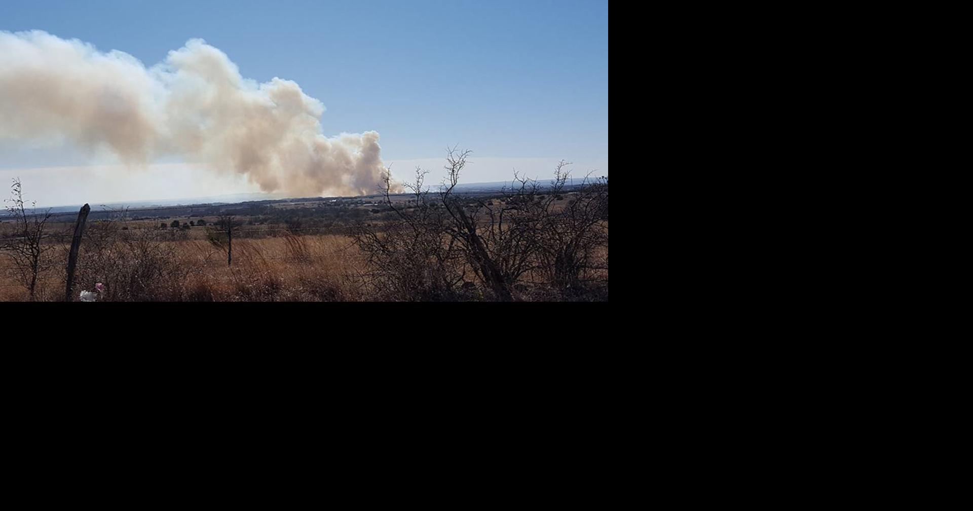 Grass fire nearly contained, firefighter injured | Local News ...
