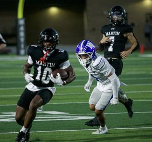 Roos overwhelmed by Arlington Martin’s athleticism in district opener