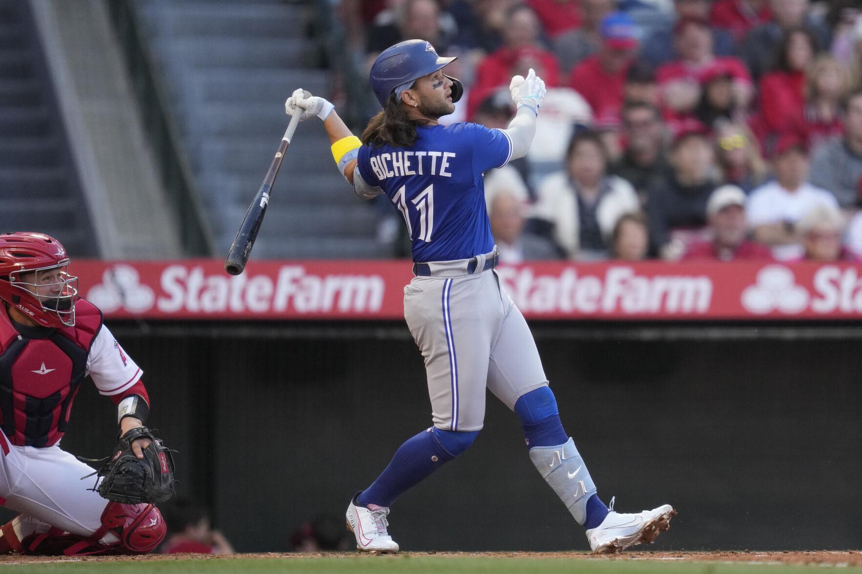 Belt hits 2 of Blue Jays' 5 home runs off Hunter Greene in 10-3 rout of Reds