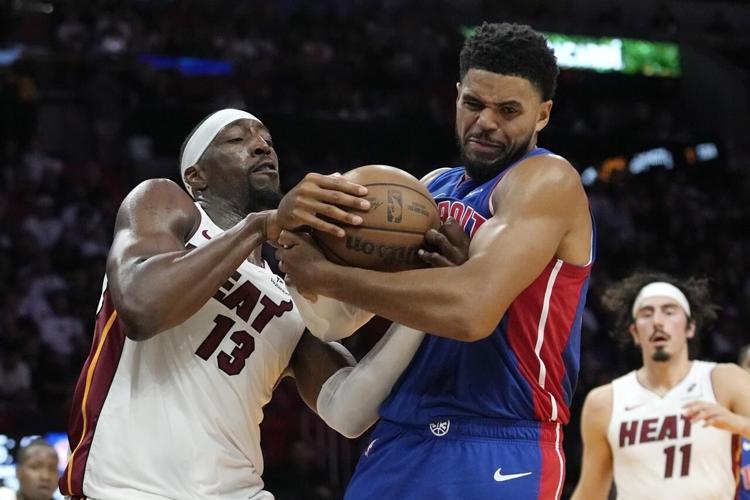 Butler scores 23, Rozier adds 20 and Heat pull away in 4th to beat