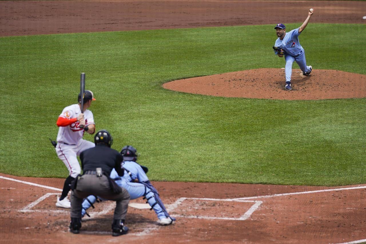 Baltimore Orioles' Adley Rutschman follows through on a swing during the  first inning of a baseball game between the Baltimore Orioles and the  Toronto Blue Jays, Thursday, Aug. 24, 2023, in Baltimore.