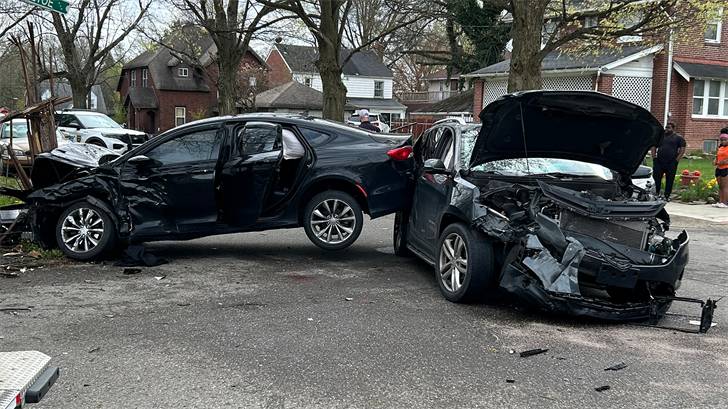 Car crash shears utility pole, sends two people to hospital in ...