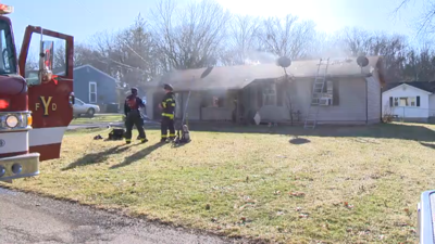 Man taken to hospital after being rescued from house fire in Youngstown ...