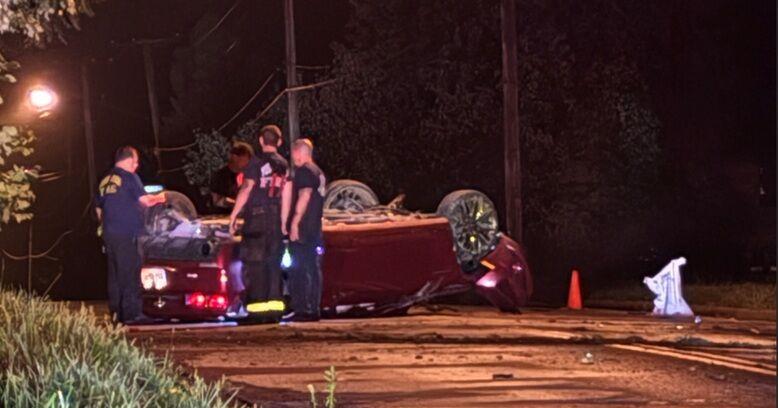 Car slams into pole, rolls over in Youngstown