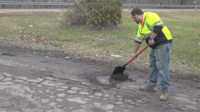 Road crews work to repair roads throughout the Mahoning Valley ...