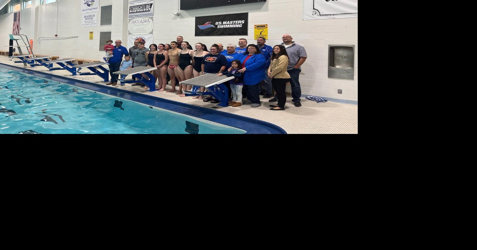 Donors take inaugural dive off of newly-purchased diving blocks at ...
