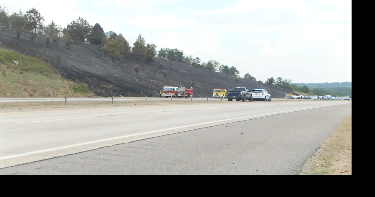 Multiple crews battle large brush fire on I-520, schools dismiss early ...