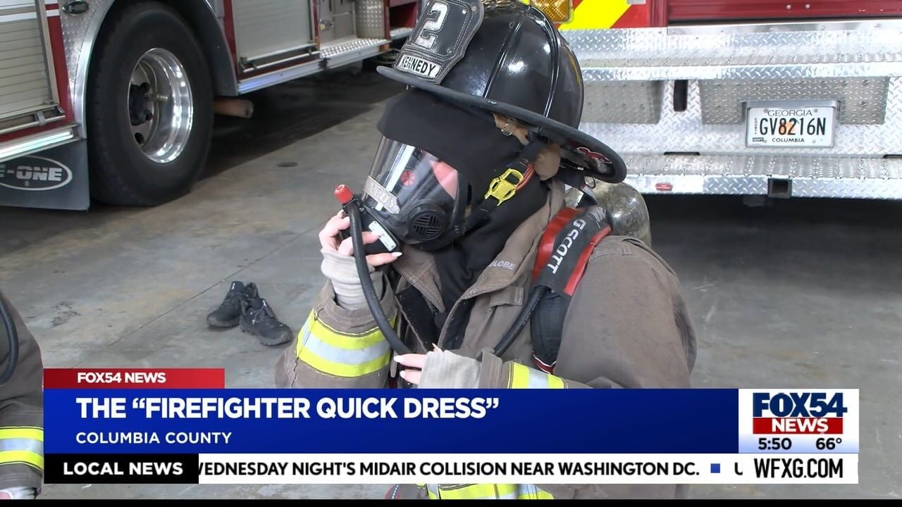 Getting dressed on a deadline; Columbia County Fire demonstrates the quick  dress