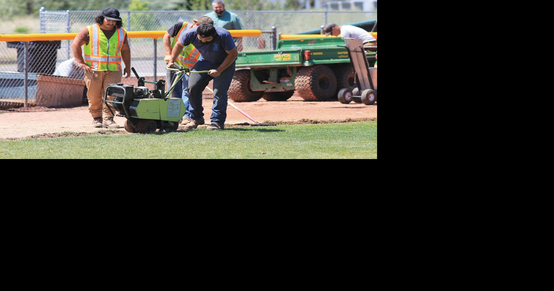 Field day: Community members gather for work day at Little League ball ...