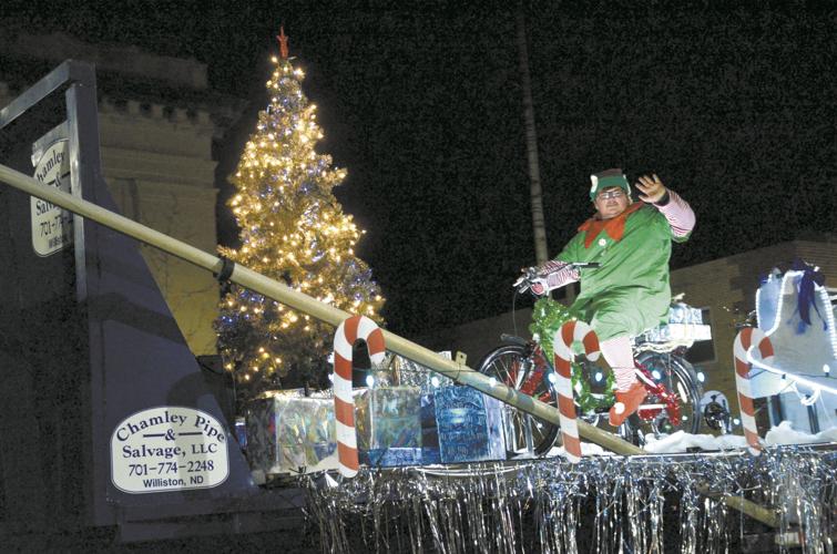 Thousands turn out to help celebrate 25th annual Holiday Lights Parade