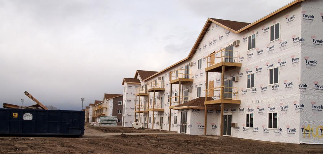 Apartment developers trying to ride out oil slump Local News