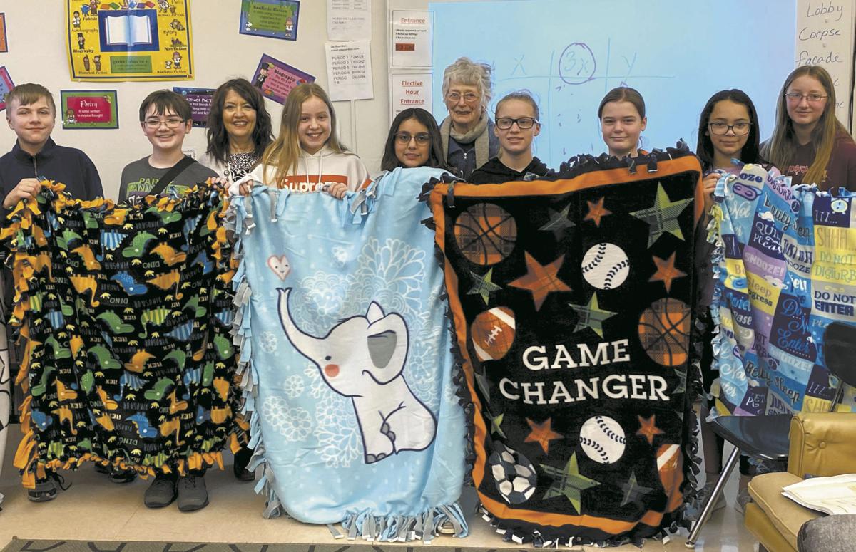 Bakken students donate blankets to Family Crisis Shelter Education
