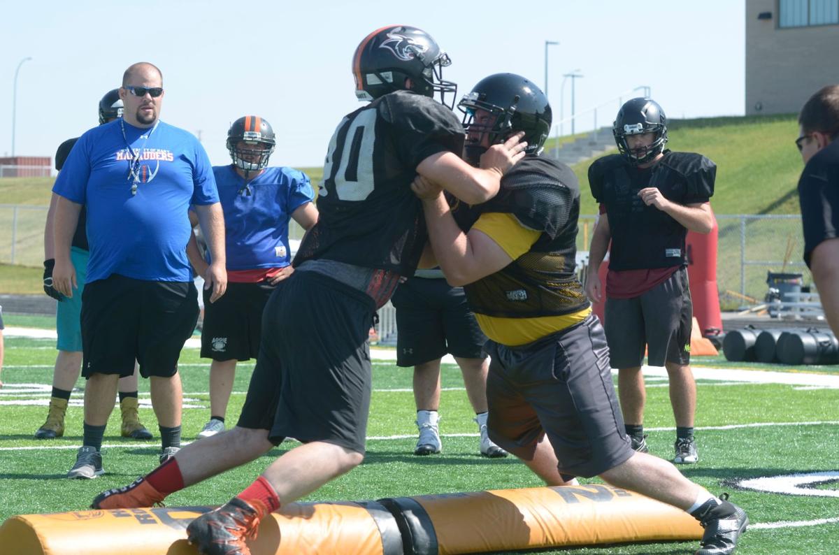 Qvale comes home NFL lineman brings football camp to Williston Local