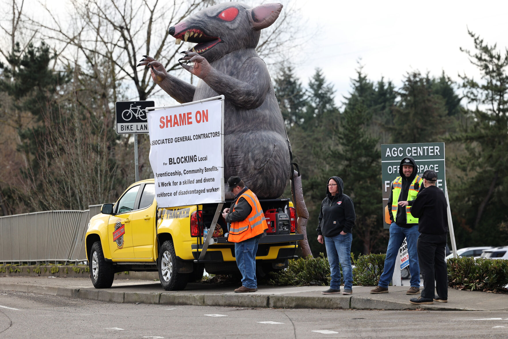 What was with the rat? Union holds protest in Wilsonville