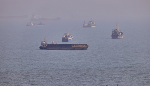 Two Ships Attacked in Strait of Hormuz Amidst U.S. Threat of Military Action