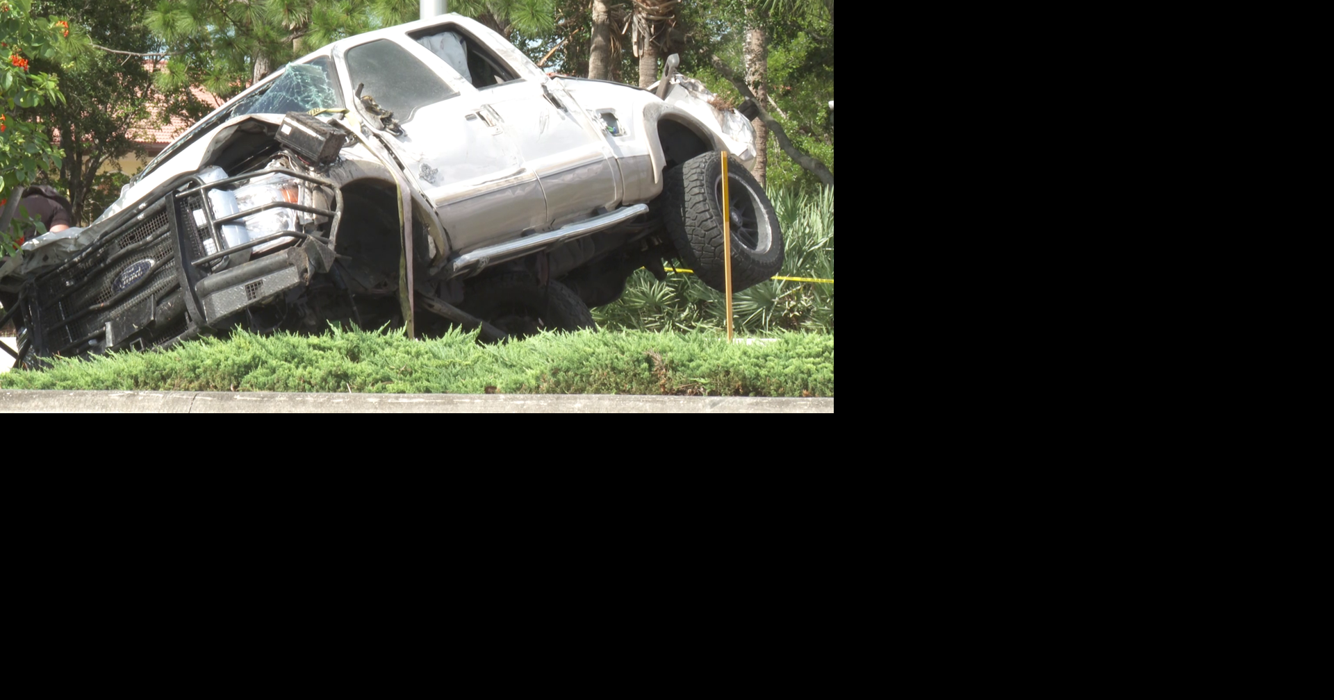 Law enforcement responds to vehicle crash blocking Estero intersection