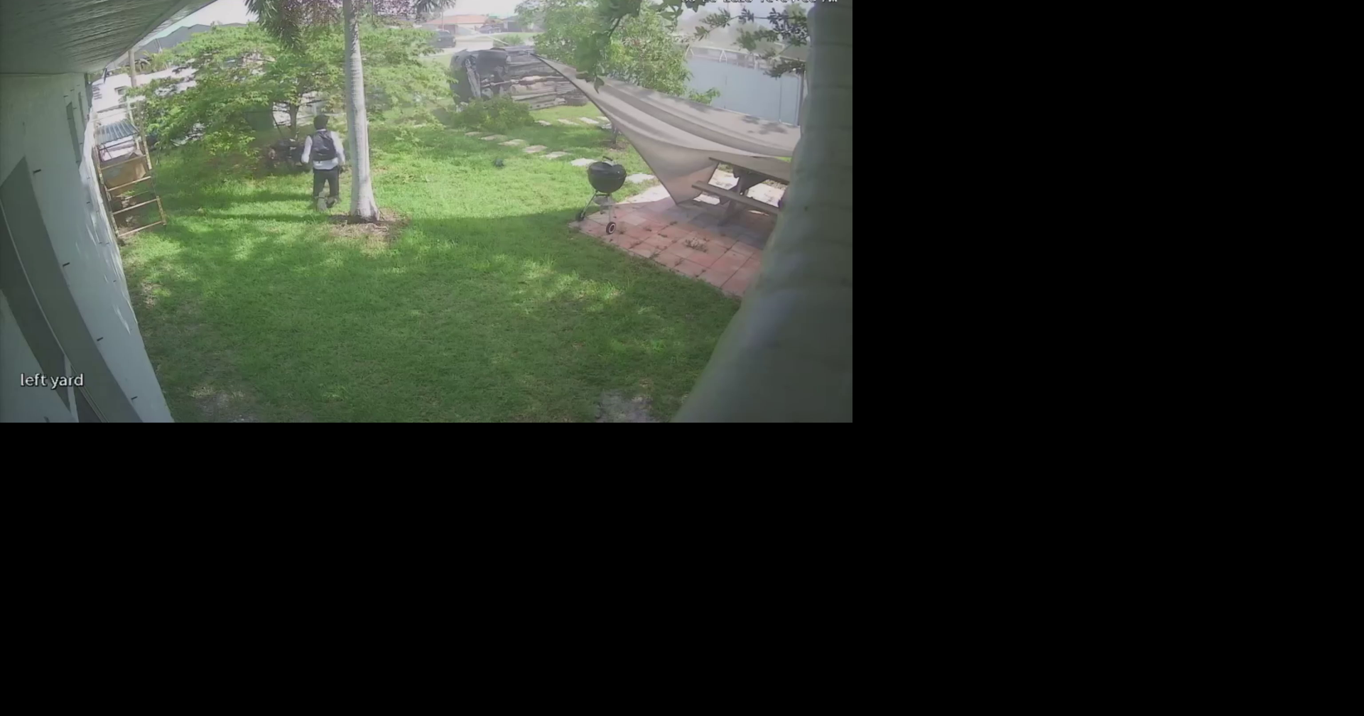 Security video captures car crashing into Cape Coral backyard, ejecting two men