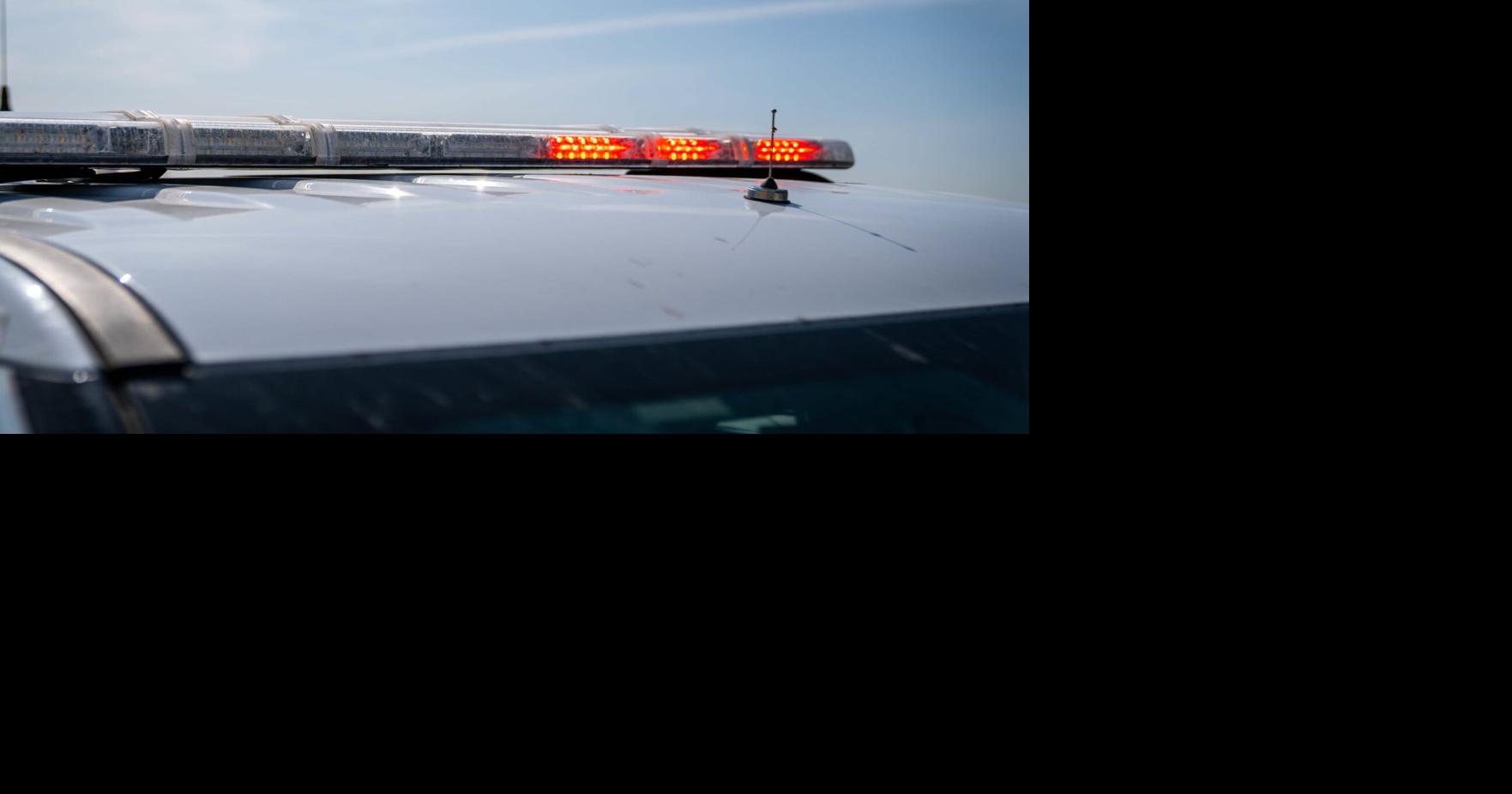 Woman charged after erratic driving report