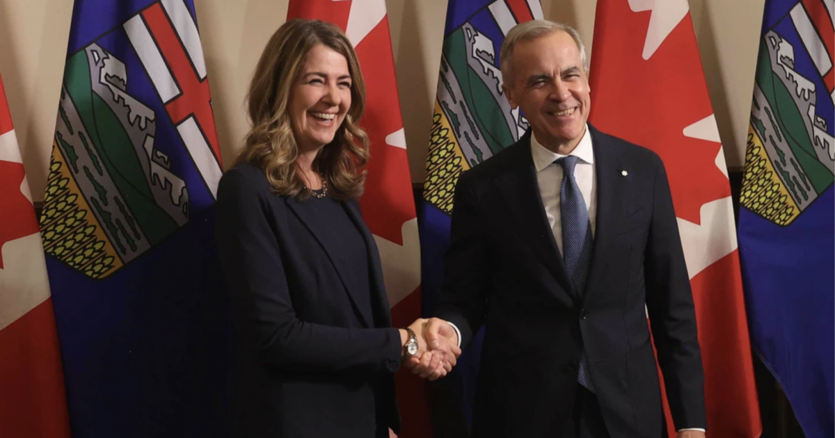 Alberta Premier Danielle Smith, left, and Prime Minister Mark Carney