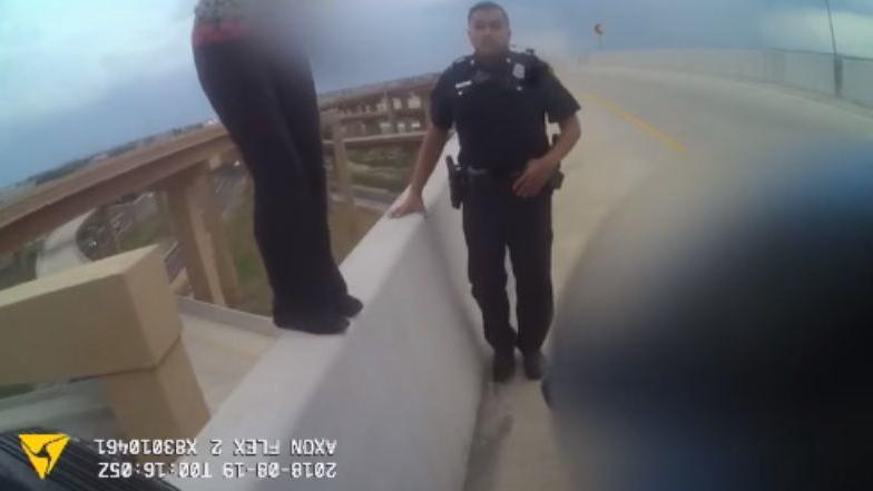Image result for officers Justin Henry and partner Trae Cierzan who saved a woman