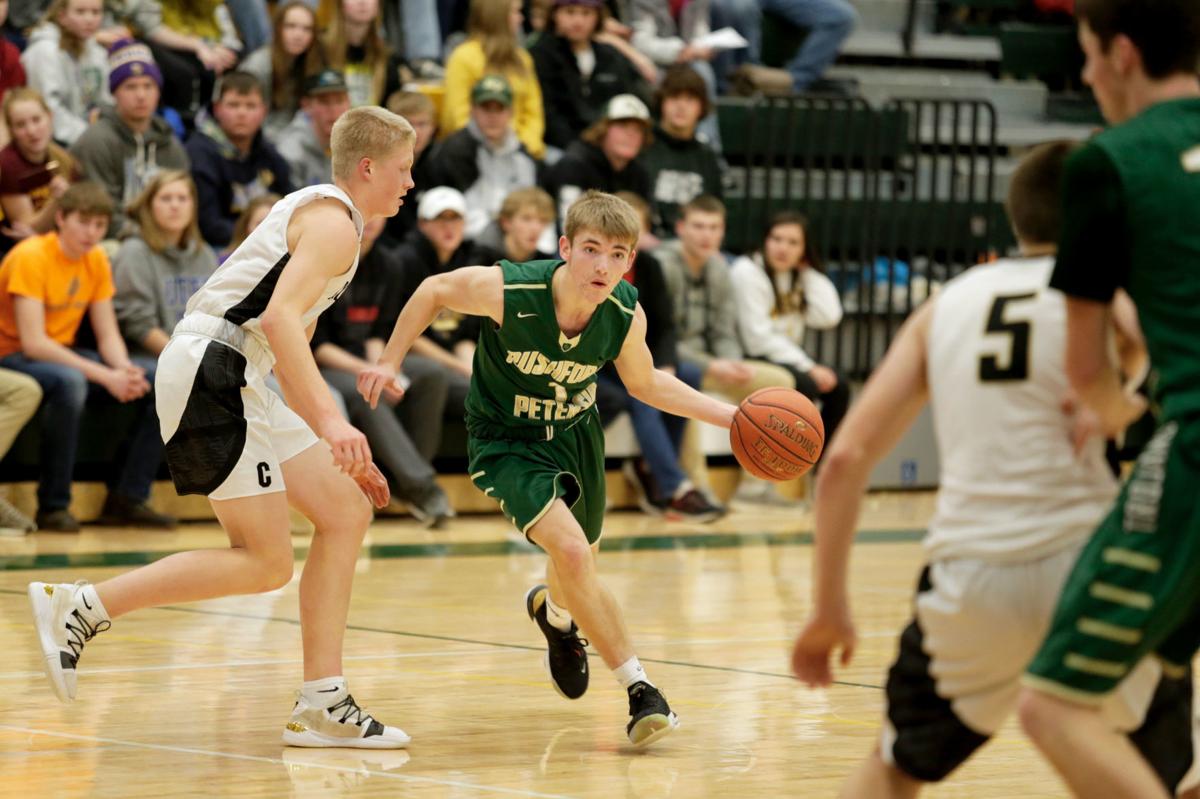 High school sports roundup Trojans hang tough before falling to Caledonia