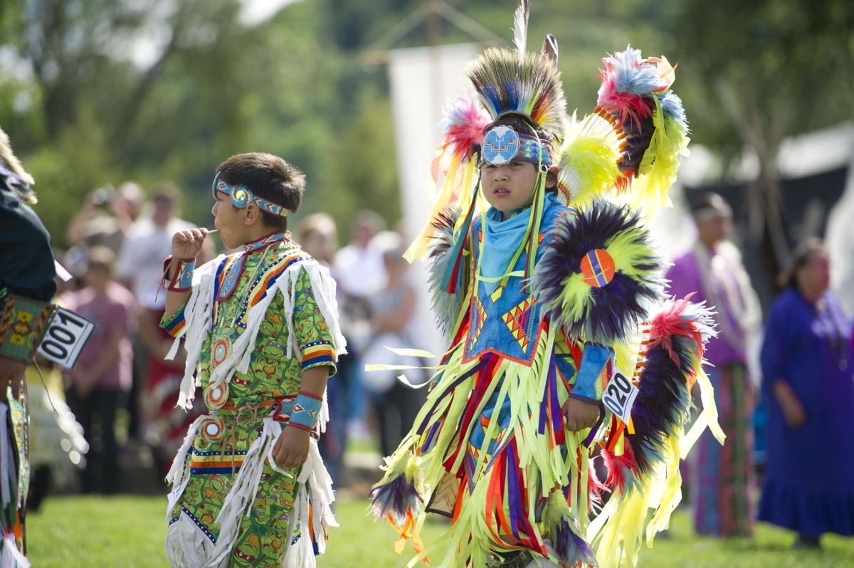 Grand Entry at Great Dakota Gathering encourages people to dance