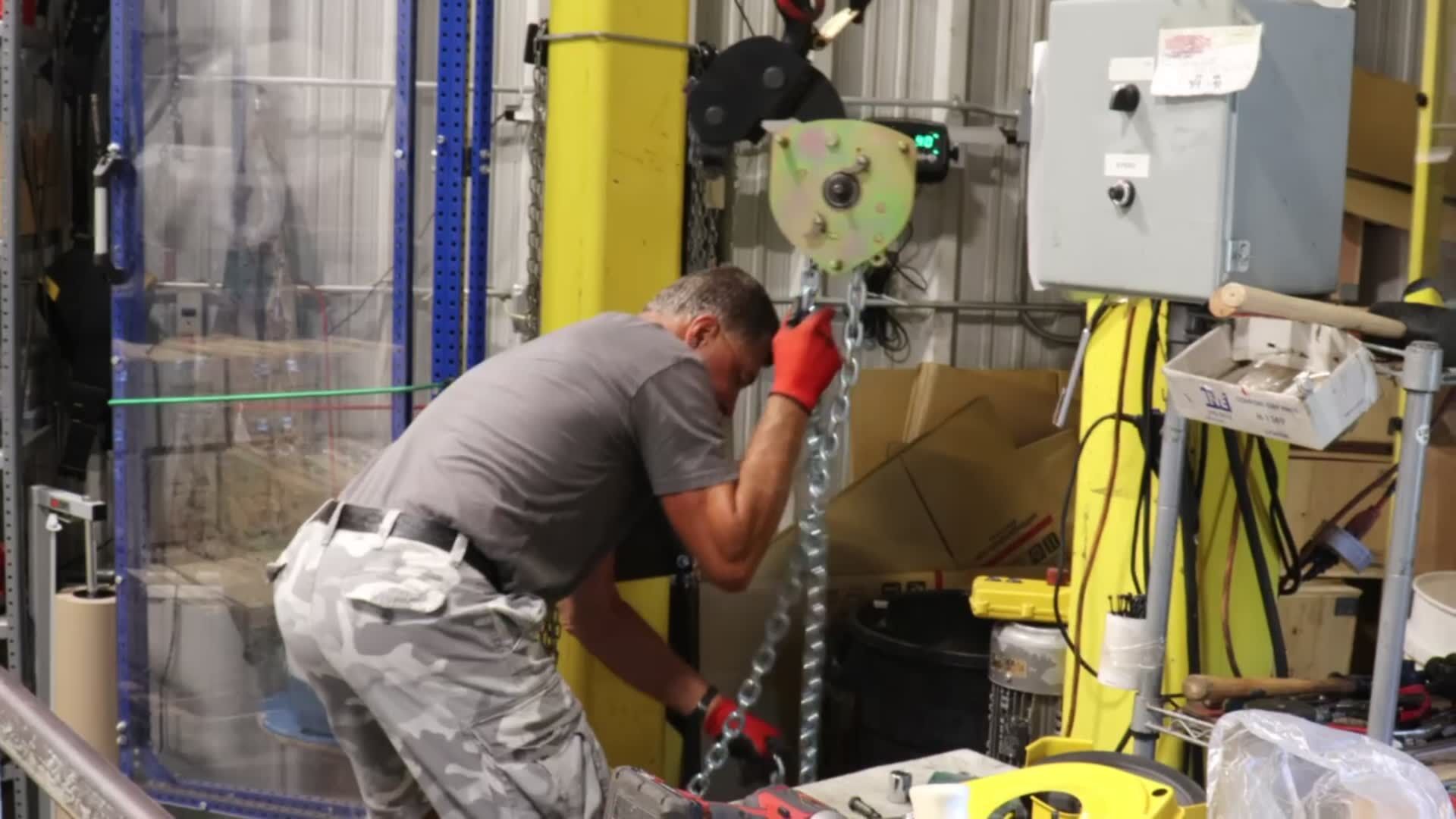 Employees At OZ Lifting Products Prepare Products To Be Sold