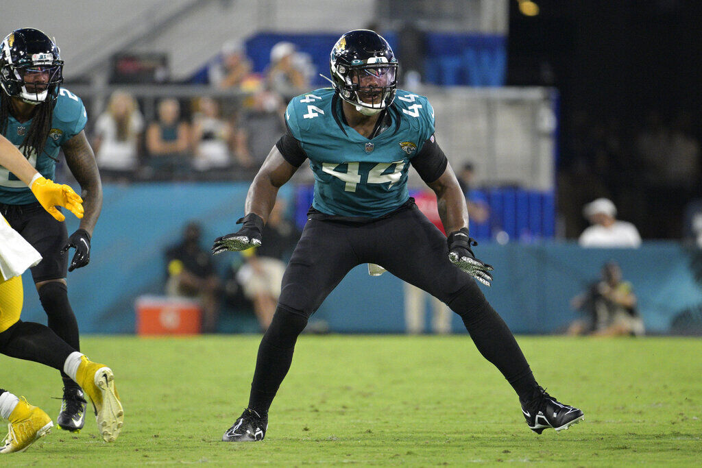 Jacksonville Jaguars linebacker Travon Walker (44) walks the sideline  during the second half of an NFL football game against the Baltimore  Ravens, Sunday, Nov. 27, 2022, in Jacksonville, Fla. The Jacksonville  Jaguars