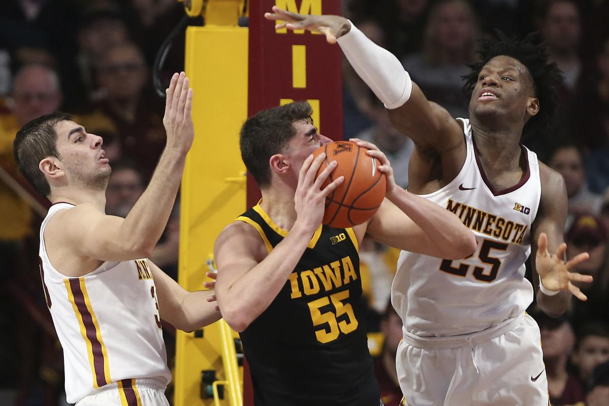 College Basketball Iowa Holds Off Gophers In Big Ten Battle