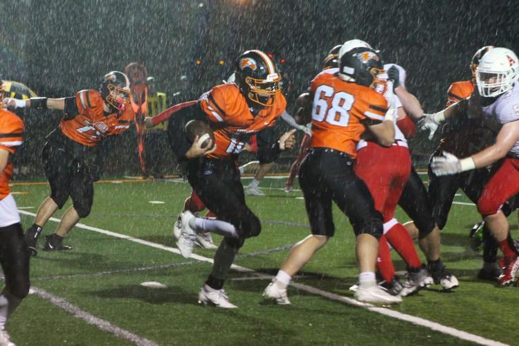 High school football Winona rushes to rainy victory