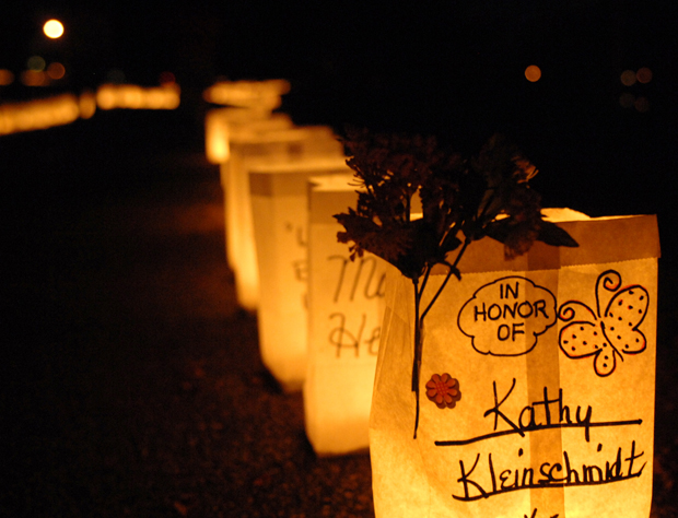 Luminarias brighten path for cancer walk