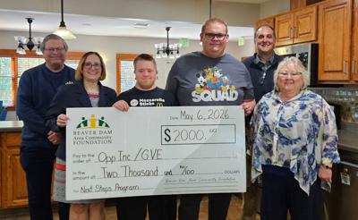 From left, Tom Heffron, Beaver Dam Area Community Foundation president; Angela Van Heesch, Life Enrichment manager; Gavin Sekel, Hunter Jones, Jason Frey, Opportunities, Inc. executive vice president/chief operating officer; Barb LeDuc, Opportunities, Inc. president/chief executive officer.