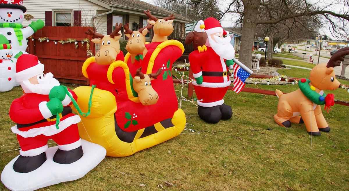 Holiday blow-up! Inflatable decorations a Christmastime hit | Regional ...