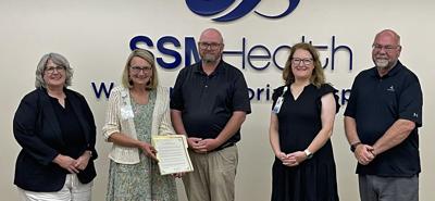 From left, Kathy Schlieve, city of Waupun administrator; DeAnn Thurmer, SSM Health St. Clare Hospital - Baraboo/SSM Health Ripon Community Hospital/SSM Health Waupun Memorial Hospital president; Rohn W. Bishop, city of Waupun mayor; and Nicole Gill, SSM Health Ripon Community Hospital/SSM Health Waupun Memorial Hospital vice president, clinical administrator; Dan Siebers, Waupun City Council; celebrate the SSM Health 75th anniversary with a mayoral proclamation on June 16.