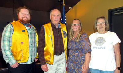 Sauk Prairie Lions Club members, from left, Ben Marsden, Leon Mindham, Brenda Statz of Farmer Angel Network, and Lion Linda Lintl on May 20.
