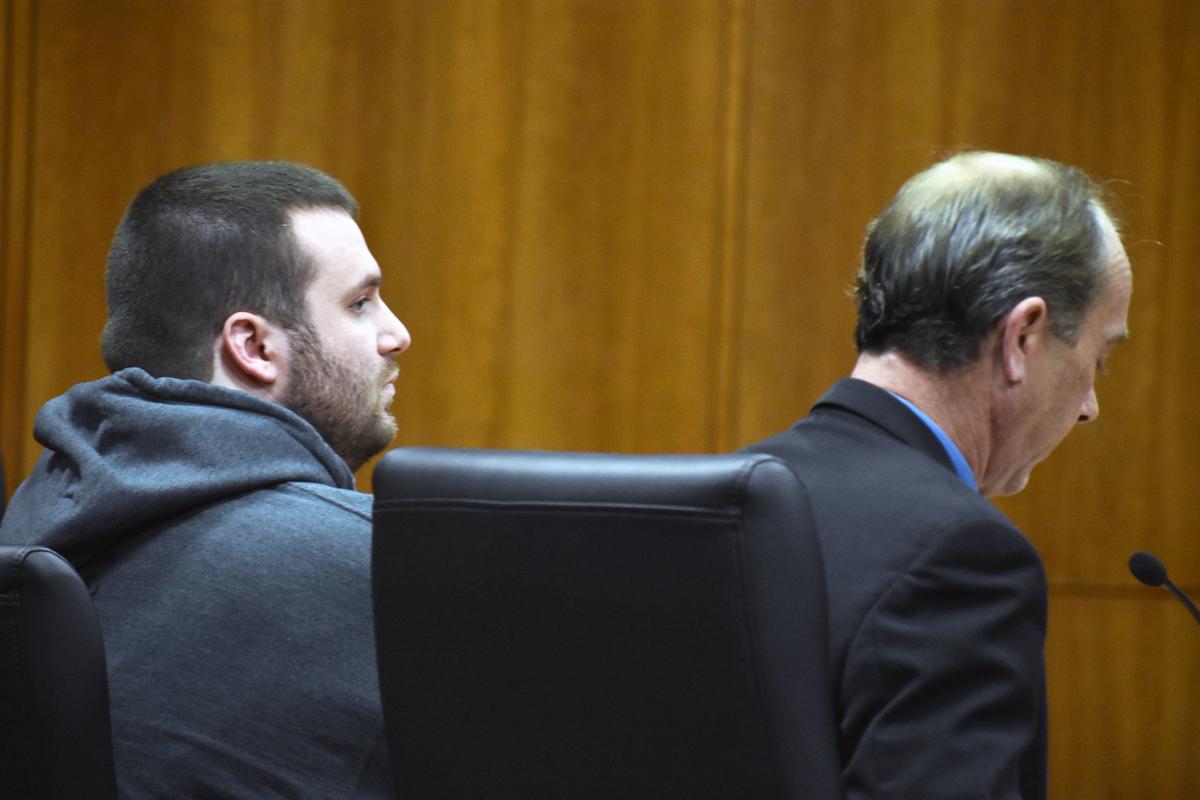 Mitchell Manthey in court with attorney