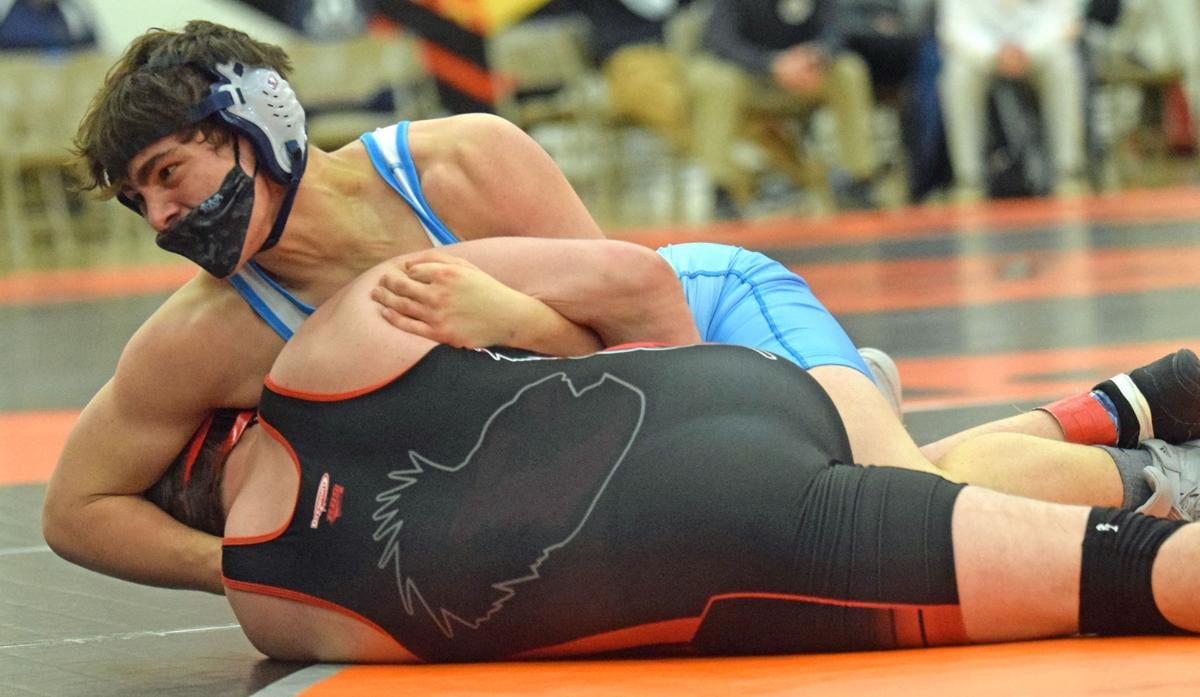 PREP WRESTLING Wisconsin Dells' Isaacson powers way to state with