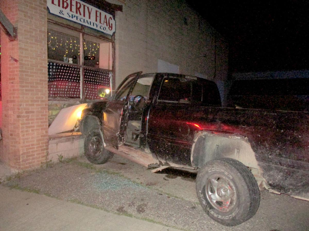 Elroy man arrested after crashing pickup into Liberty Flag building in