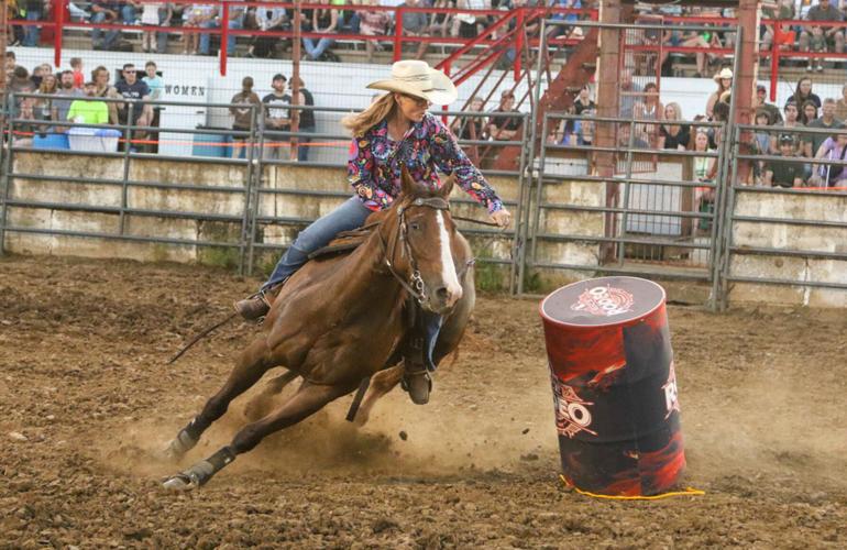 Unknown competitor in barrel racing competition at the 2025 rodeo.