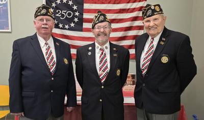 Beaver Dam Community Library hosts the American Flag presentation by American Legion Post 146 with, from left, Randy Jaeckel, commander, Paul Hines, and Floyd Henschel on March 11.