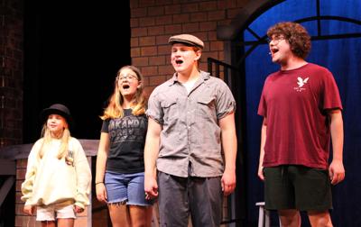 Cast members “Newsies” at rehearsal July 31 at Portage center for the Arts. From left, Greenly Neeb, Lodi; Anastasia Alden, Endeavor; Braydn Hamilton, Westfield; Lathan Donahue, Baraboo.