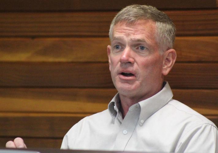 Mark speaks at meeting