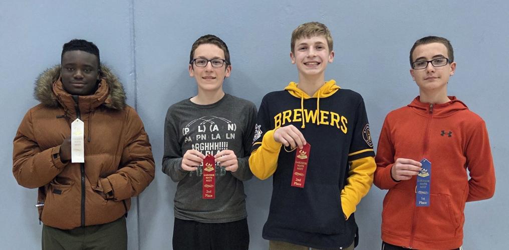 Individual eighth grade winners at the Lakeside Lutheran elementary math meet April 29 include, from left, Felix Ofori-Gyebi, Westside Christian, Middleton, third-place; Manny Butzine, Holy Cross, Madison, tied for second; Noah Hirschfeld, St. John’s Juneau, tied for second; Elliot Redecker, St. John’s Juneau, first.