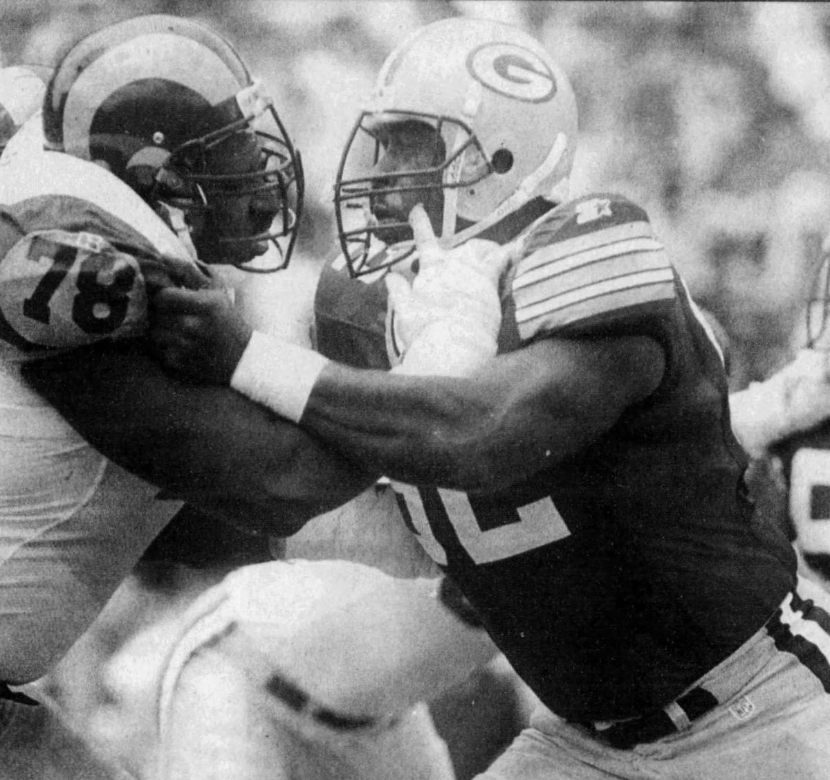 Reggie White, Jackie Slater