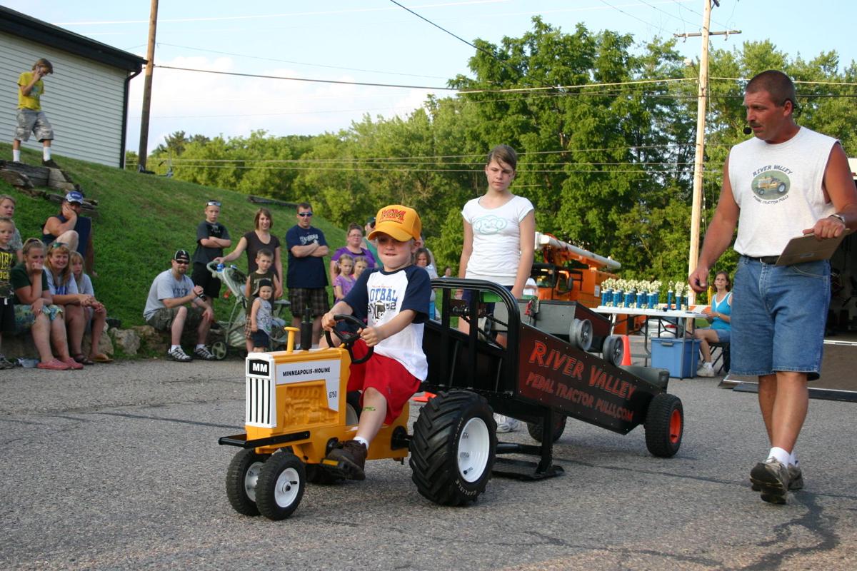 They've got PULL Kids show pedal power during 'tractor' pull