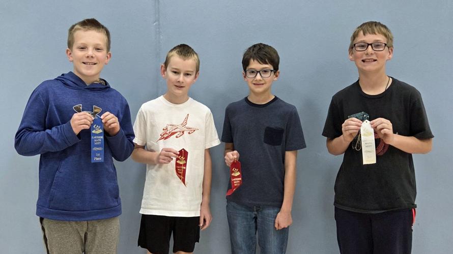 Individual fifth grade winners at the Lakeside Lutheran elementary math meet April 29 include, from left, Aaron Behl, Holy Cross, Madison, first-place; Keith Stiemke, Eastside, Madison, tied for second; Gabe Schwertfeger, Eastside, Madison, tied for second; Isaac Hirschfeld, St. John’s, Juneau, third-place.