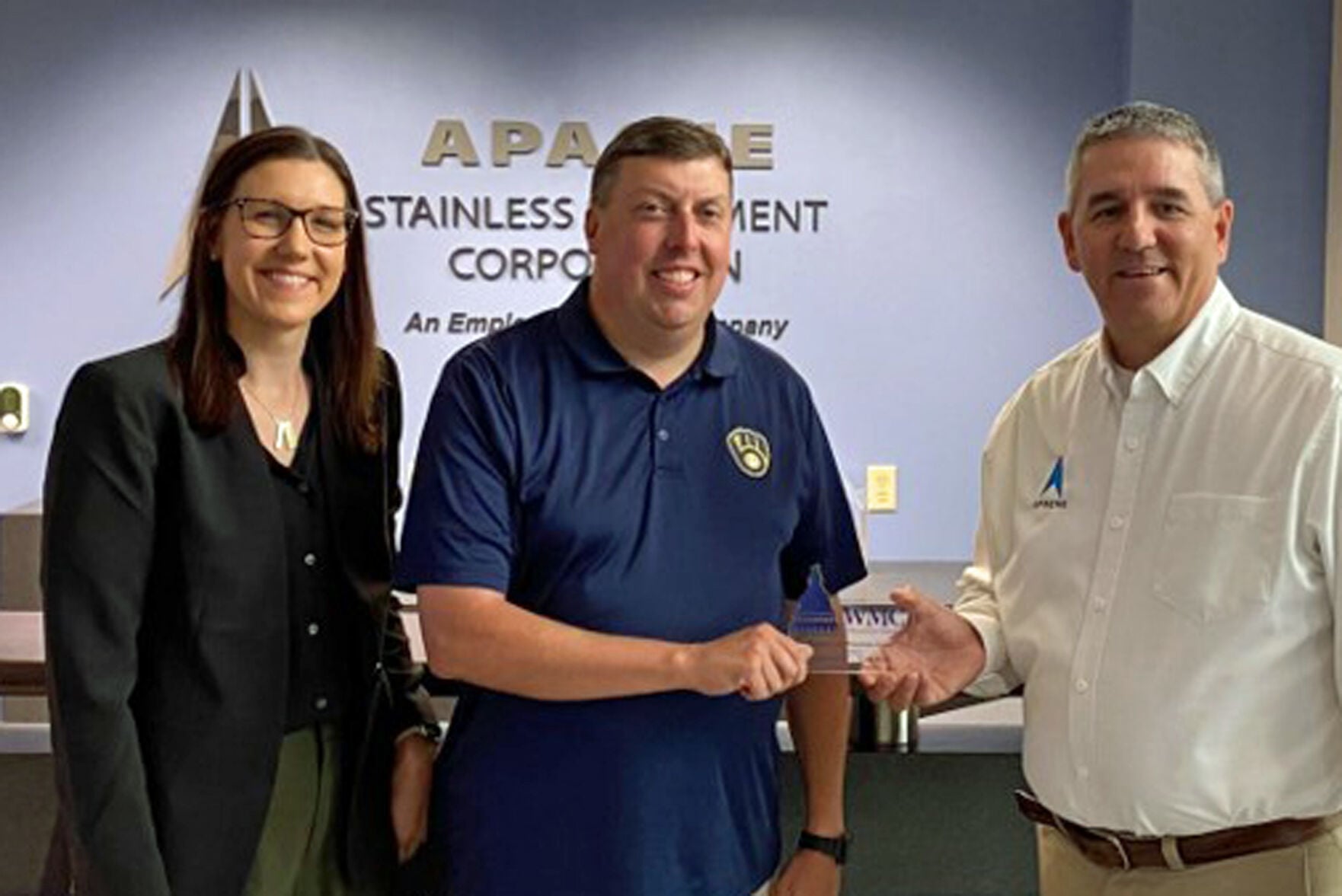 From left, Rachel Ver Velde, Wisconsin Manufacturers & Commerce; presents Rep. Mark Born with the Working for Wisconsin Award on Aug. 10 with Jerry DeWitz of Apache Stainless.
