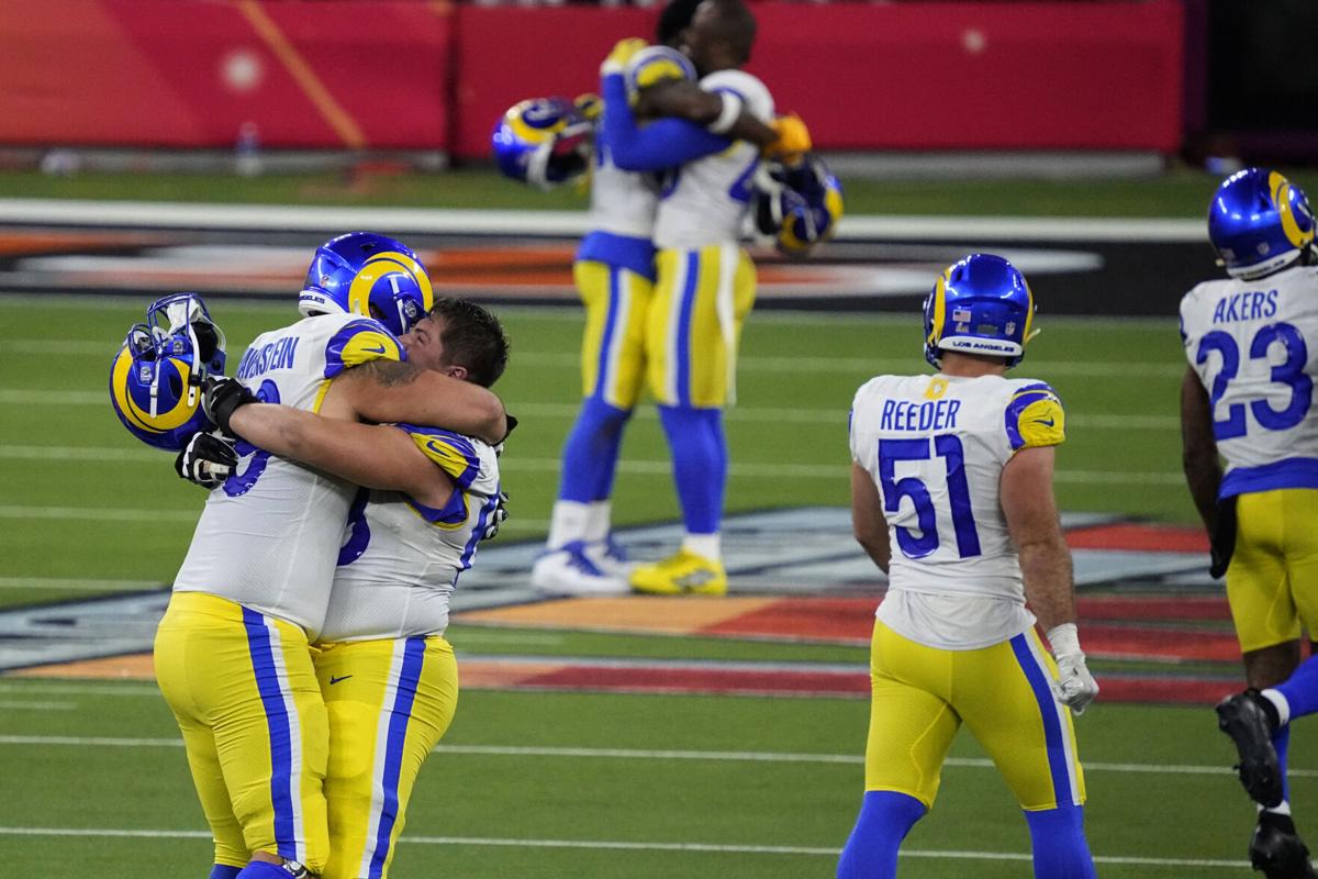 Los Angeles Rams quarterback Matthew Stafford (9) stands for the National  Anthem before taking on the Cincinnati Bengals in Super Bowl 56, Sunday,  Feb. 13, 2022 in Inglewood, Calif. The Rams defeated